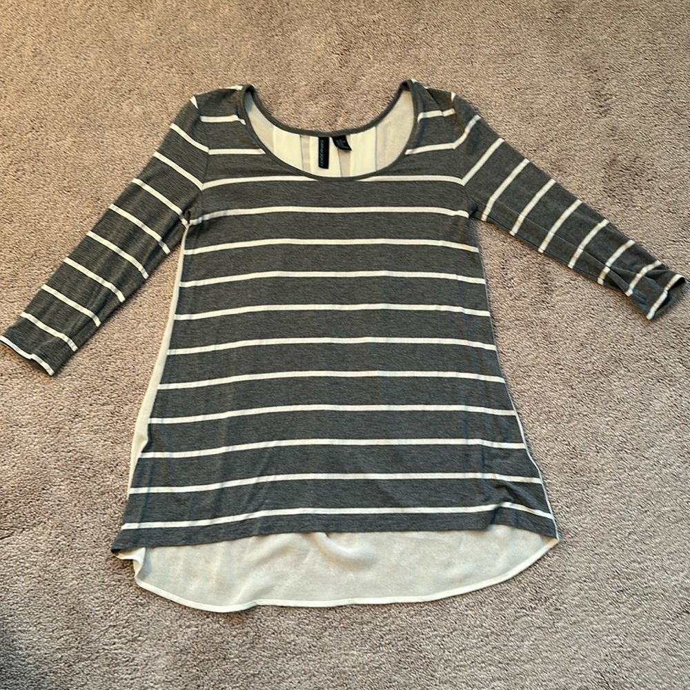 Striped three-quarter length sleeve top.